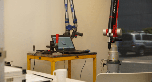 Metrology workplace with computers open and using specialist software