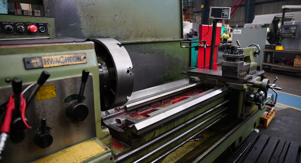 Heavy duty Hwacheon manual engine lathe in an Australian heavy industry machine shop